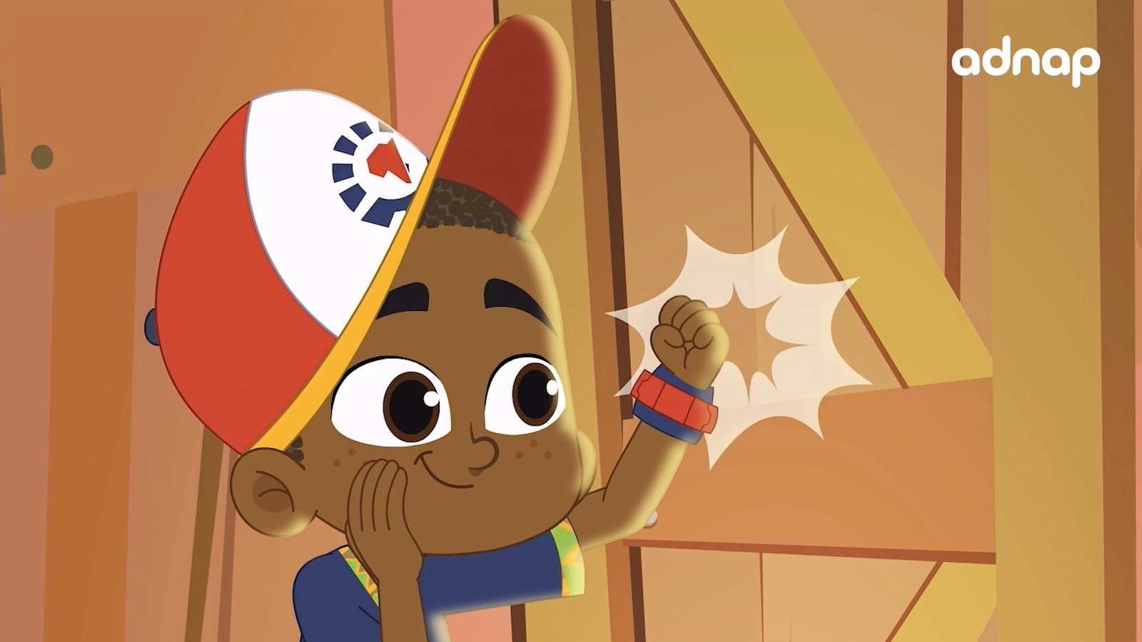 Close-up of a cheerful cartoon boy in a backwards red-and-white cap raising a fist
